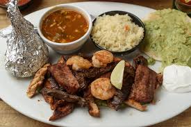La Pagua signature dishes FajitasEnchiladaAl Pastor Taco